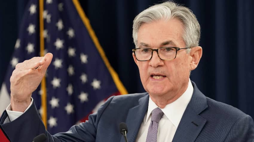 US FINANCIAL MARKETS: Stocks swing as Federal Reserve chair Jerome Powell signals more rate hikes